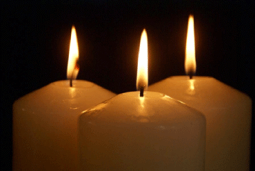 Three Advent candles lit 