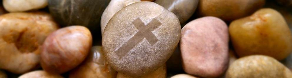 pebbles with cross