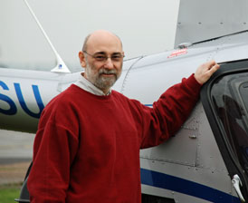 Photo of Rev Dr Sam Cappleman a helicopter pilot about to fly